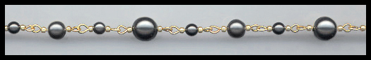 Handlinked Black Pearl and Gold Chain